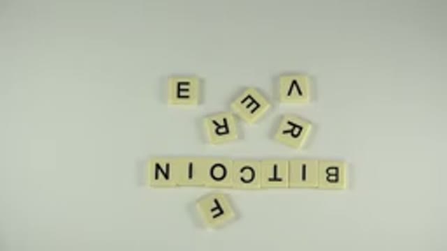 WESTMINSTER COLORADO-2015: Off Screen Person Arranges White Letter Tiles On