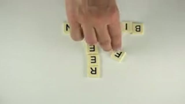 WESTMINSTER COLORADO-2015: Two People Playing Word Game With Letter Tiles