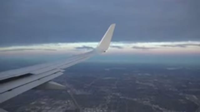 PLAYA DEL CARMEN MEXICO-2015: Plane Flying Over A City Before Arriving At The Airport