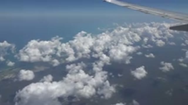 PLAYA DEL CARMEN MEXICO-2015: Clouds Seen From Airplane In Flight