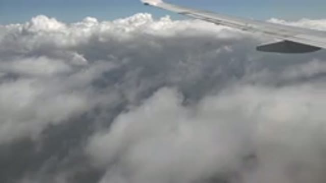 PLAYA DEL CARMEN MEXICO-2015: Airplane Flying Through The Skies Zooming On The