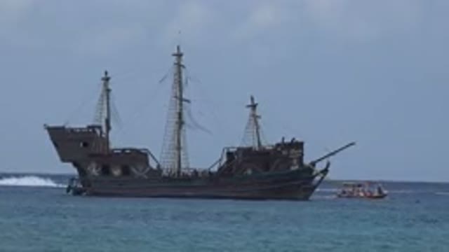 PLAYA DEL CARMEN MEXICO-2015: Large Gray Ship In Water On A Clear Day