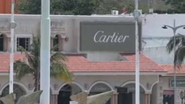 PLAYA DEL CARMEN MEXICO-2015: Someone Focusing A Smart Phone On A Luxury Retail