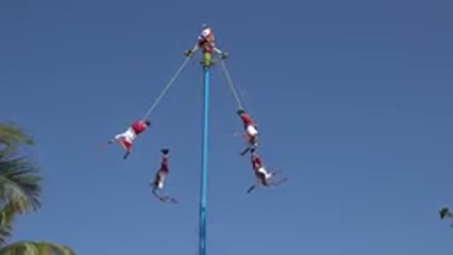 PLAYA DEL CARMEN MEXICO-2015: Video Showing People Spinning On Ropes Which Are