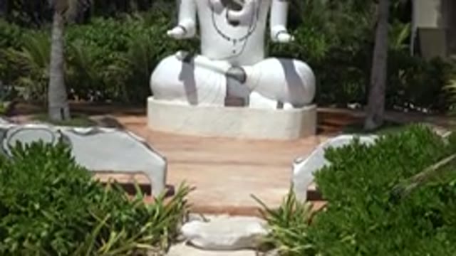 PLAYA DEL CARMEN MEXICO-2015: White Statue of Elephant Head God Sitting in Park