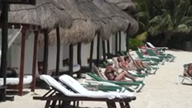 PLAYA DEL CARMEN MEXICO-2015: People Relaxing And Sleeping On Beautiful Beach