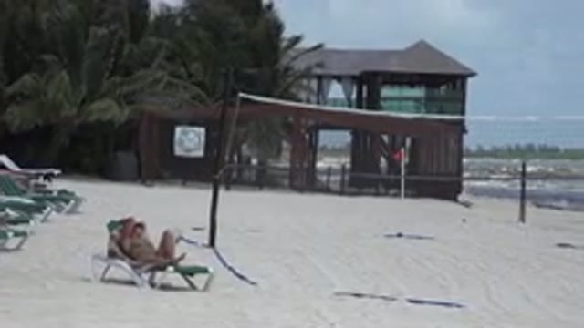 PLAYA DEL CARMEN MEXICO-2015: Volleyball Net and Building Near the Beach