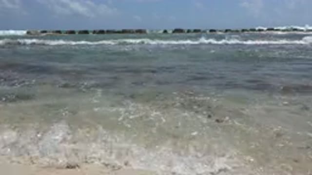 PLAYA DEL CARMEN MEXICO-2015: Lake With Many White Capped Waves Crashing Onto