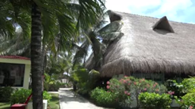 PLAYA DEL CARMEN MEXICO-2015: A Beach Brown Hut On A Sunny Day