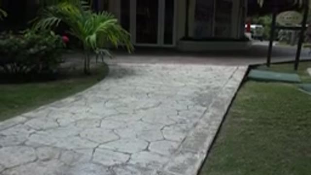 PLAYA DEL CARMEN MEXICO-2015: Walkway Leading Up To A House