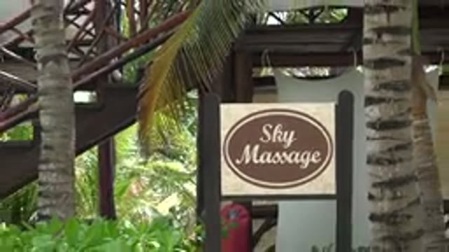 PLAYA DEL CARMEN MEXICO-2015: Zooming Out From A Sign That Says Sky Massage At A