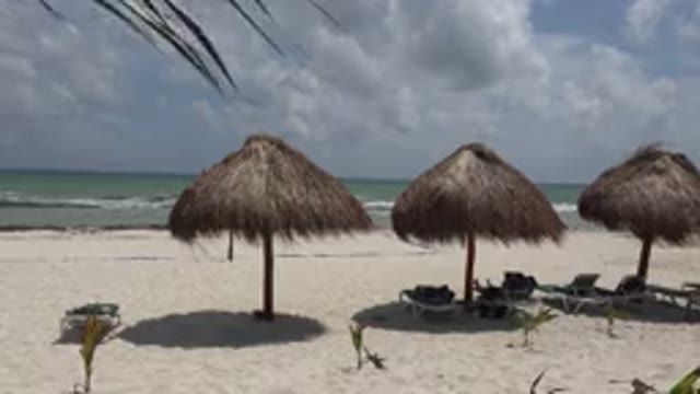 PLAYA DEL CARMEN MEXICO-2015: A Beach On A Sunny Blue Sky And Wind Day With