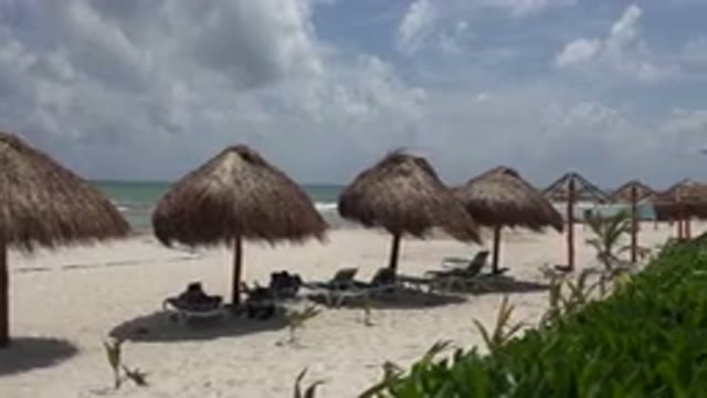 PLAYA DEL CARMEN MEXICO-2015: Vacationers Enjoying The Warm Sunny Day On The Beach