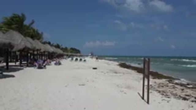 PLAYA DEL CARMEN MEXICO-2015: Sandy Beach Line With Water Flowing Back And Forth