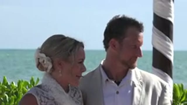 PLAYA DEL CARMEN MEXICO-2015: Beautiful Couple Posing For Photo Surrounded By Greenery And Sea