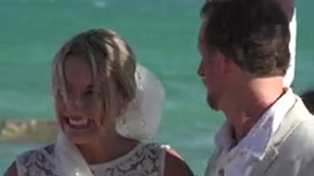 PLAYA DEL CARMEN MEXICO-2015: Happy Bride Is Holding A Bouquet Of Flowers And