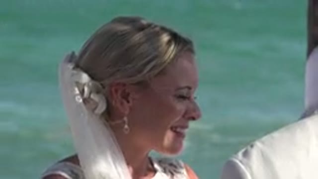 PLAYA DEL CARMEN MEXICO-2015: Bride Has A Beachfront Wedding And Is Thrilled To