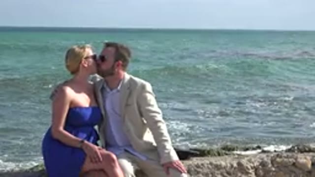 PLAYA DEL CARMEN MEXICO-2015: Couple Expressing Love With Beach In Background