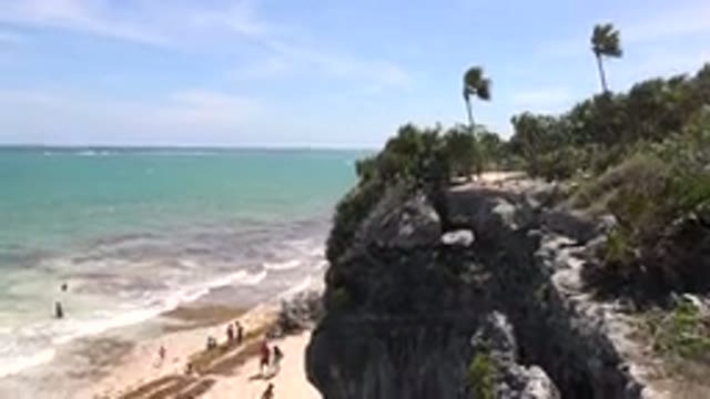 TULUM MEXICO-2015: Cliff By The Ocean Side On A Sunny Day