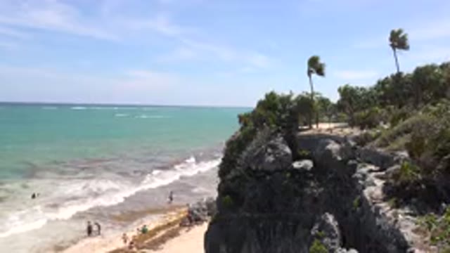 TULUM MEXICO-2015: Family Enjoying Beach Day With Waves And Sun