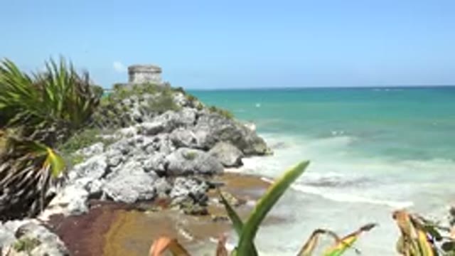 TULUM MEXICO-2015: Natural House In The Rocks In Beach With Wind Blowing Strong