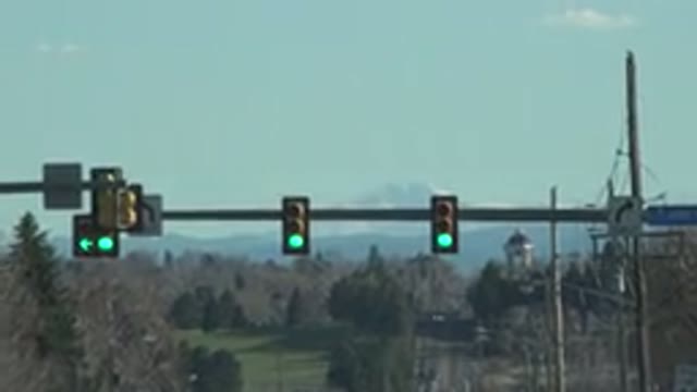 DENVER COLORADO-2015: Street Light Champ Road Cars Church Trees Grass Winter