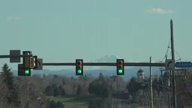 DENVER COLORADO-2015: Two Traffic Signs Open in Green
