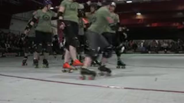 DENVER COLORADO-2015: White Teenagers In Green Tank Tops Skating Together