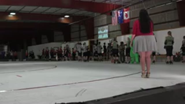 DENVER COLORADO-2015: A Lady Singing the National Anthem at Public Event