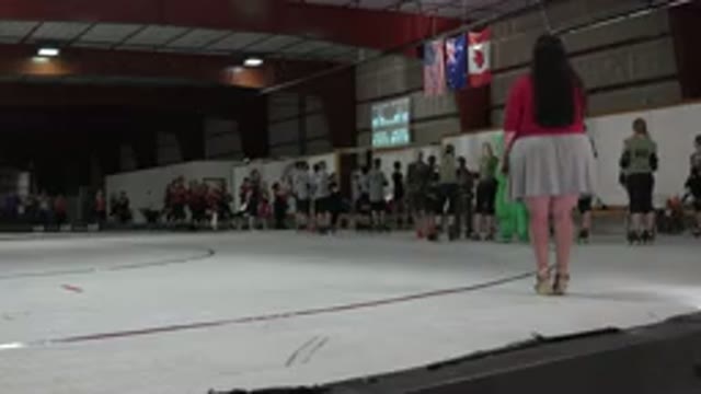 DENVER COLORADO-2015: Roller Rink With A Crowd Formed Around It But No