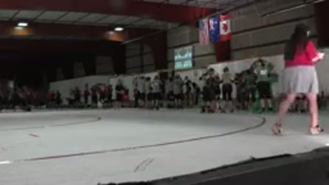 DENVER COLORADO-2015: Teams Of People On Skates Gather At A Skating Rink