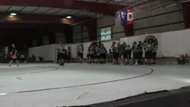 DENVER COLORADO-2015: Players Engage in Indoor Skating Game