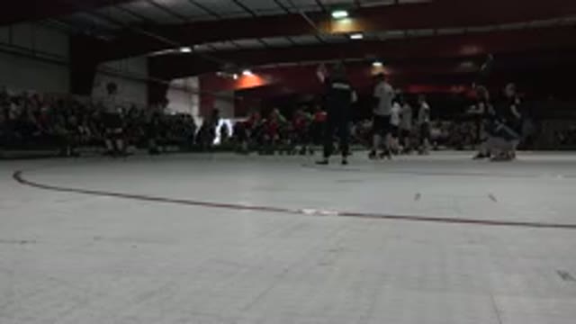 DENVER COLORADO-2015: Two Roller Derby Teams Prepare To Compete Inside A Gym As
