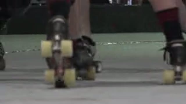 DENVER COLORADO-2015: Lots Of People Roller Skating In A Rink With Flashing Lights