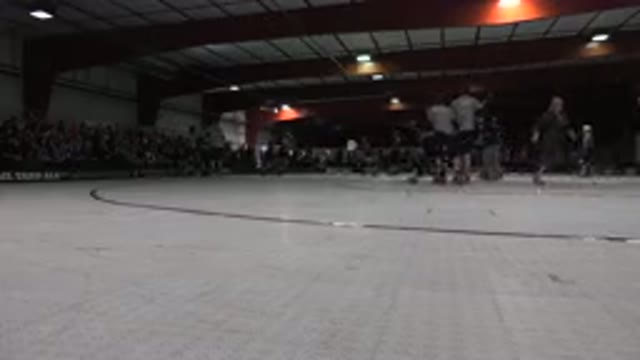DENVER COLORADO-2015: Group Of People Doing Skating In A Stadium Full Of