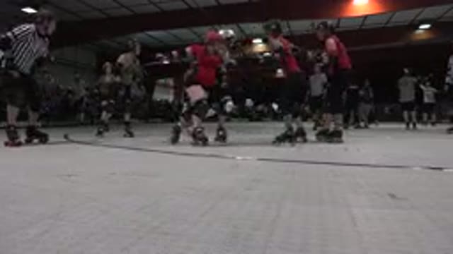 DENVER COLORADO-2015: Skaters Skating On Red And White Rink