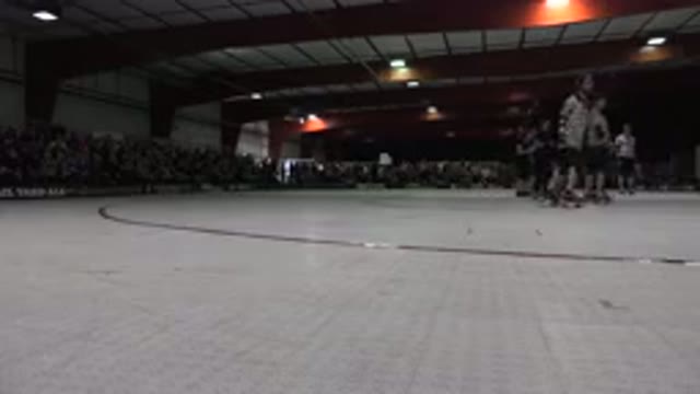 DENVER COLORADO-2015: People Ice Skating Slowly As They Are Watched By Hundreds