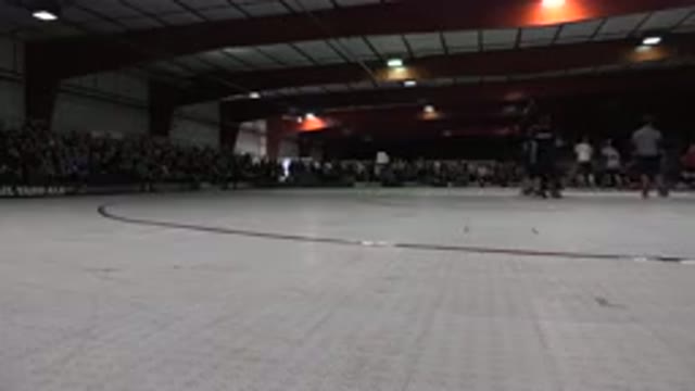 DENVER COLORADO-2015: People Skating On Red And White Indoor Skating Rink