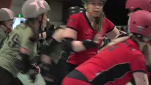DENVER COLORADO-2015: Women Competing Fiercely in Hockey Game