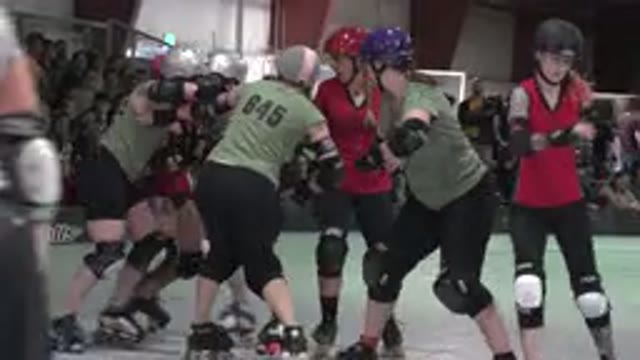 DENVER COLORADO-2015: A Group Of Rollerblading Women Pushing And Shoving One Another