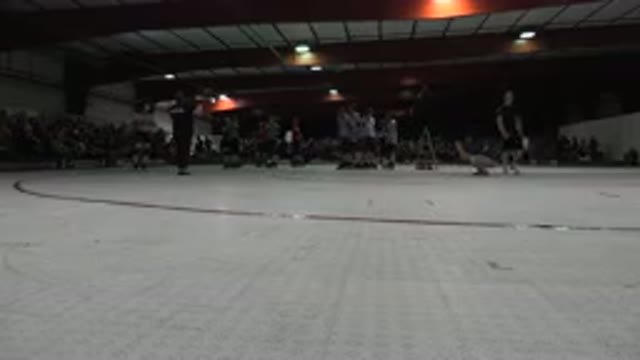 DENVER COLORADO-2015: People In A Gym That Are Either Sitting Walking Or Roller Skating