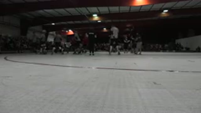 DENVER COLORADO-2015: Skaters Standing On Red And White Indoor Roller Rink