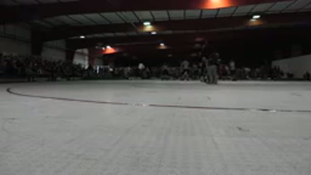 DENVER COLORADO-2015: Rollerblades At A Stadium Skating Around In Unison In The