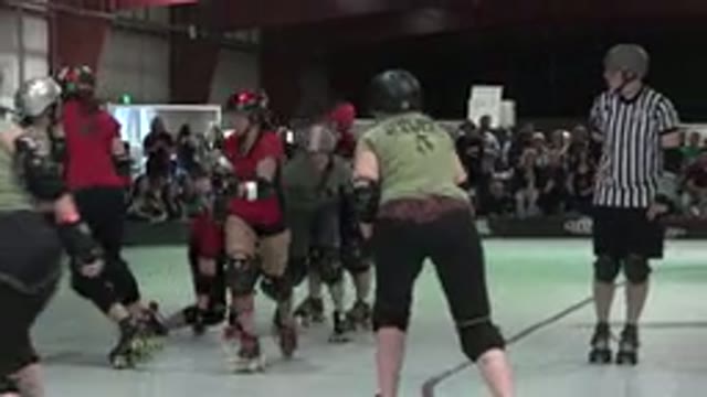 DENVER COLORADO-2015: Female Crowd Rollerskating At Sports Event