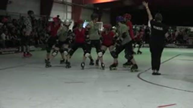 DENVER COLORADO-2015: Roll Skating Teams Red And Green Getting Ready To Start