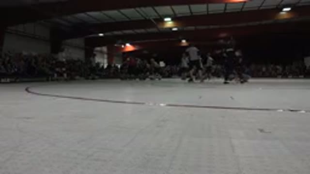 DENVER COLORADO-2015: A Hockey Game On A White Hockey Field With Two Teams One