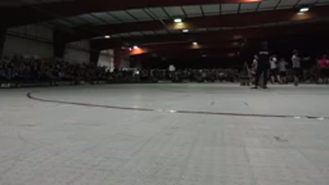 DENVER COLORADO-2015: White And Red Derby Rink With Referees Standing In Center