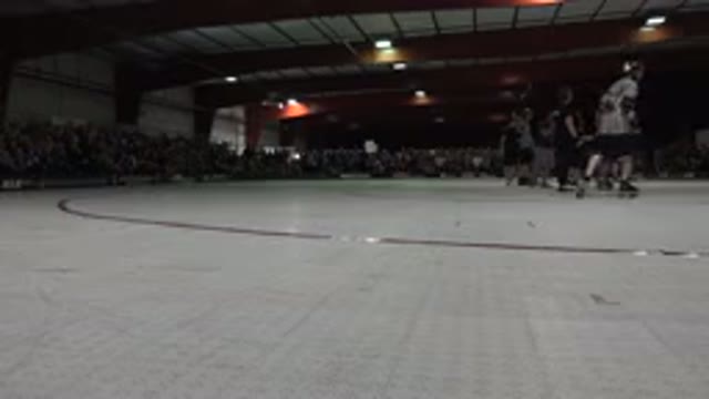 DENVER COLORADO-2015: Group Of People Roller Skating In A Public Venue With