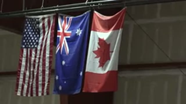 DENVER COLORADO-2015: Three Beautiful Flags Of The USA Australia And Canada