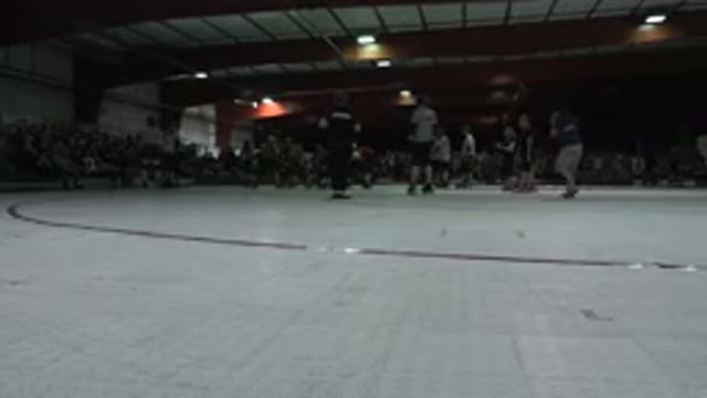 DENVER COLORADO-2015: Youth Hockey Game With Players On Collar Skates In A Gym